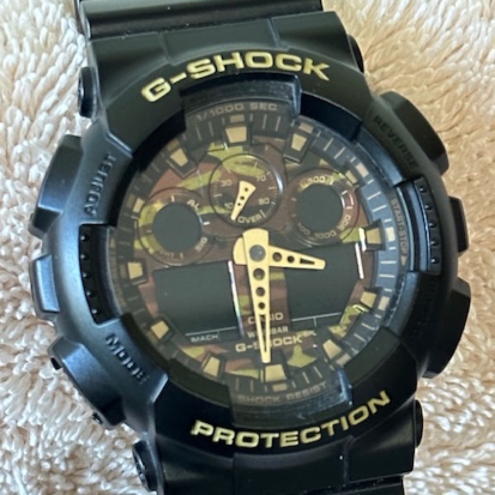 G-SHOCK GA100CF1A9 ANALOG DIGITAL WATCH BLK/GREEN/GOLD  CAMO DIAL